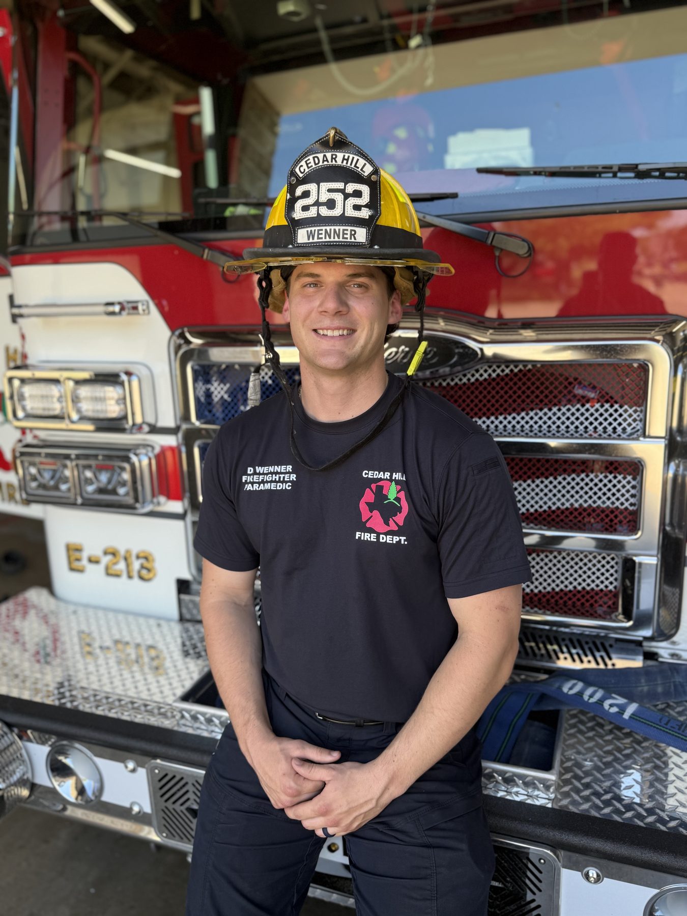 Daniel Wenner, owner of First On Lawn Services, in his Cedar Hill firefighter gear
